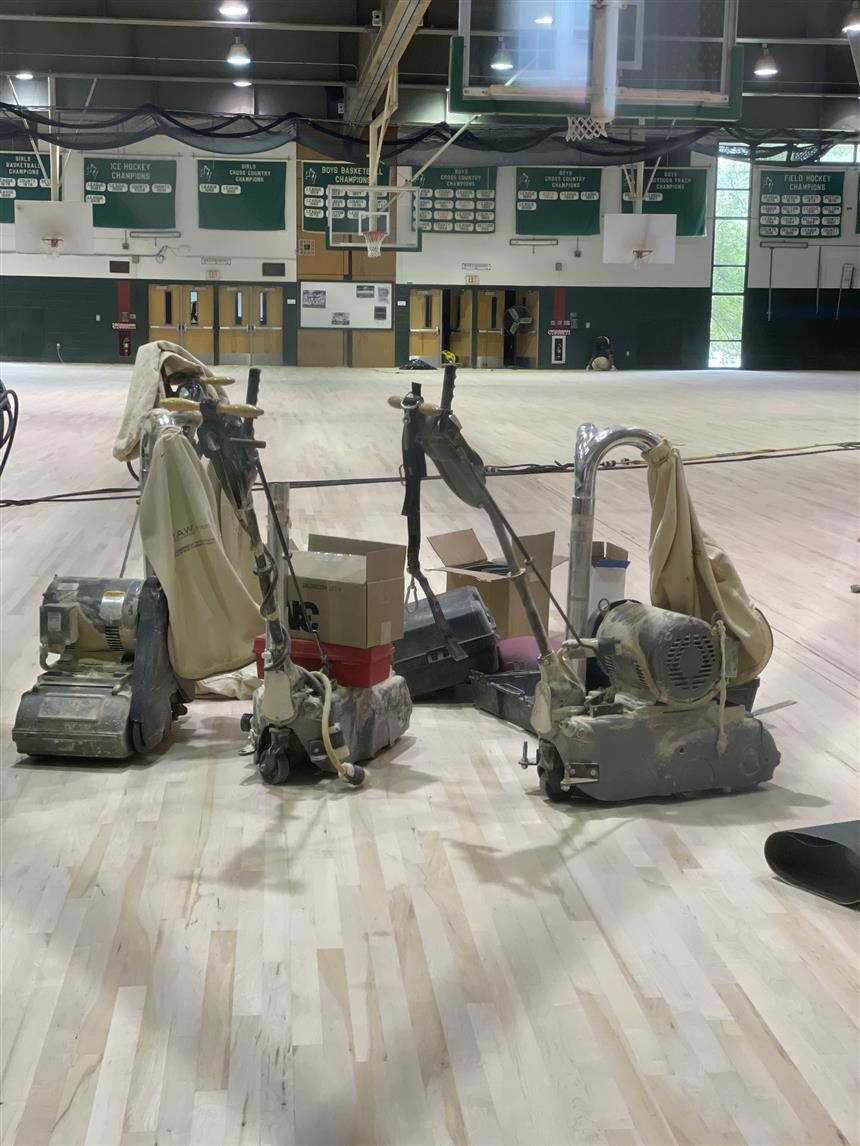 Griswold Gym being sanded; photo credit: Rae Allex